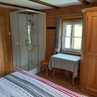 Ein Bett oder Betten in einem Zimmer der Unterkunft Haus Sonnenalm