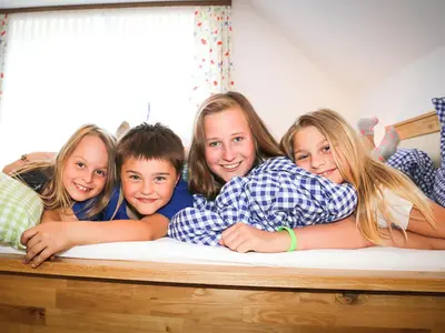 Kinder, die in der Unterkunft Ferienhaus Pichler übernachten