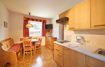Küche/Küchenzeile in der Unterkunft Aparthotel Paradies - Schrempfgut