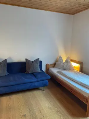 Ein Bett oder Betten in einem Zimmer der Unterkunft Ferienhaus Julia