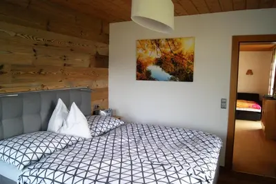 Ein Bett oder Betten in einem Zimmer der Unterkunft Steinerbauer