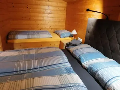 Ein Bett oder Betten in einem Zimmer der Unterkunft Steinerbauer