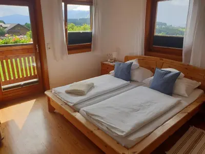 Ein Bett oder Betten in einem Zimmer der Unterkunft Bergführerhaus