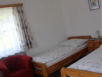 Ein Bett oder Betten in einem Zimmer der Unterkunft Haus Bruschek