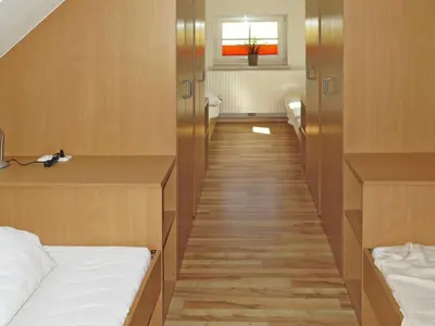Ein Bett oder Betten in einem Zimmer der Unterkunft Saunahaus Gröbming
