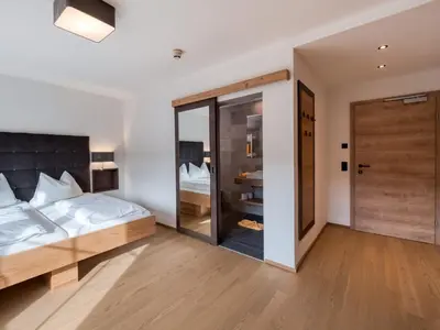 Ein Bett oder Betten in einem Zimmer der Unterkunft Hotel Matschner