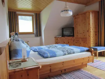 Ein Bett oder Betten in einem Zimmer der Unterkunft Kocherhof