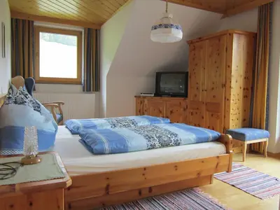 Ein Bett oder Betten in einem Zimmer der Unterkunft Kocherhof