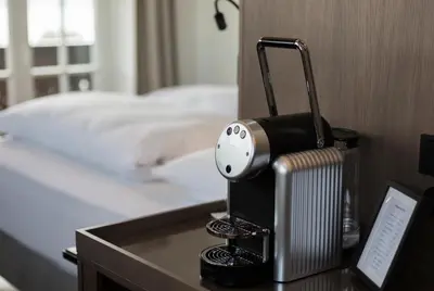 Ein Bett oder Betten in einem Zimmer der Unterkunft Boutique Hotel Aichinger