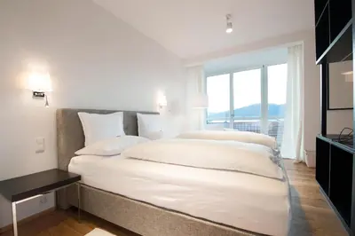 Ein Bett oder Betten in einem Zimmer der Unterkunft Boutique Hotel Aichinger