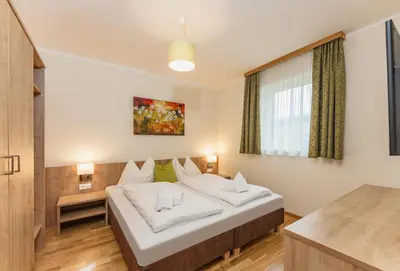 Ein Bett oder Betten in einem Zimmer der Unterkunft Appartement Alpenglocke by Schladming-Appartements
