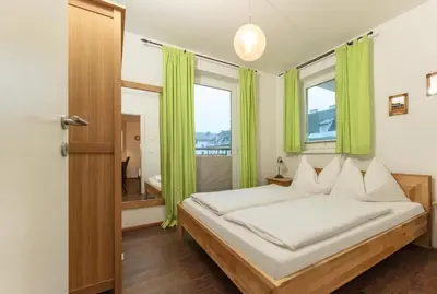 Ein Bett oder Betten in einem Zimmer der Unterkunft Appartement Lange Gasse by Schladming-Appartements
