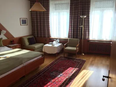 Ein Bett oder Betten in einem Zimmer der Unterkunft Seehotel Schwan