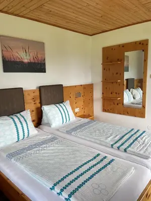 Ein Bett oder Betten in einem Zimmer der Unterkunft Gasthaus Schöberingerhof