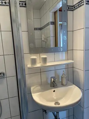 Ein Badezimmer in der Unterkunft Gasthaus Schöberingerhof