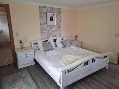 Ein Bett oder Betten in einem Zimmer der Unterkunft Berggasthof Schwaigerhof
