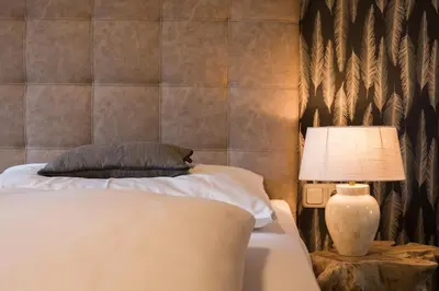 Ein Bett oder Betten in einem Zimmer der Unterkunft Gasthof Hotel Hauslwirt