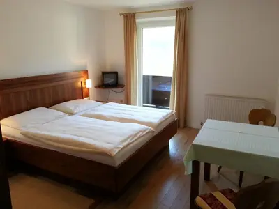 Ein Bett oder Betten in einem Zimmer der Unterkunft Rupertihof