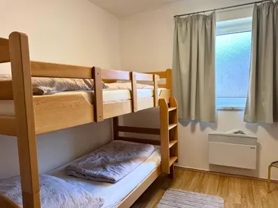 Ein Bett oder Betten in einem Zimmer der Unterkunft Haus im Grünen, Ruhe, großer eingezäunter Garten - ideal für Familien und Hunde