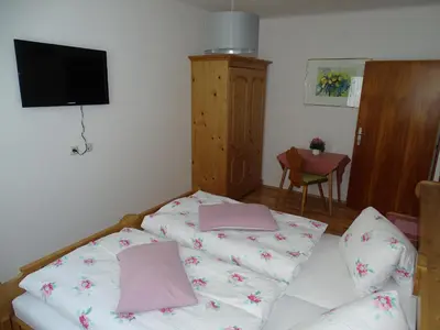Ein Bett oder Betten in einem Zimmer der Unterkunft Pension Bayrhammer