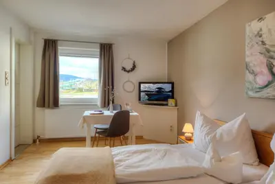Ein Bett oder Betten in einem Zimmer der Unterkunft Seepension Hemetsberger