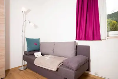 Ein Sitzbereich in der Unterkunft Apartmenthaus Lieselotte