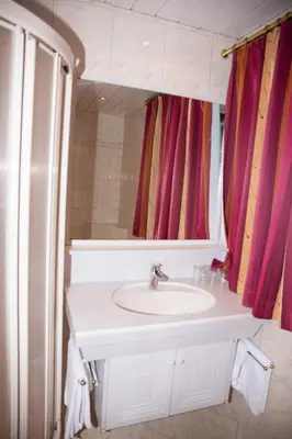 Ein Badezimmer in der Unterkunft Hotel Sonne