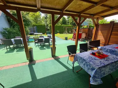 Ein Garten an der Unterkunft Pension Göschlberger