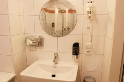 Ein Badezimmer in der Unterkunft Pension Göschlberger