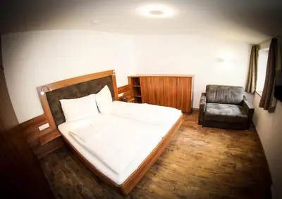 Ein Bett oder Betten in einem Zimmer der Unterkunft der Steinerwirt