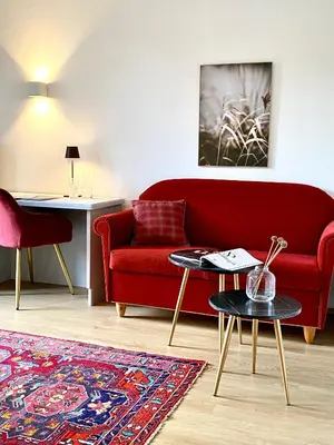 Ein Sitzbereich in der Unterkunft Boutiquehotel Hubertushof