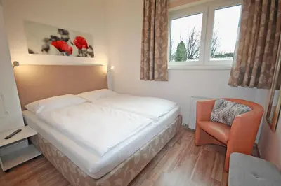 Ein Bett oder Betten in einem Zimmer der Unterkunft Ennshäusl by Schladming-Appartements