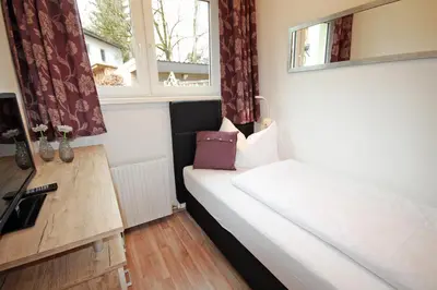 Ein Bett oder Betten in einem Zimmer der Unterkunft Ennshäusl by Schladming-Appartements