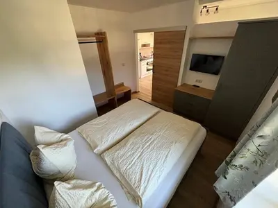 Ein Bett oder Betten in einem Zimmer der Unterkunft Apartementhaus Schöndorfer