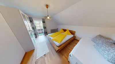 Ein Bett oder Betten in einem Zimmer der Unterkunft Apartementhaus Schöndorfer