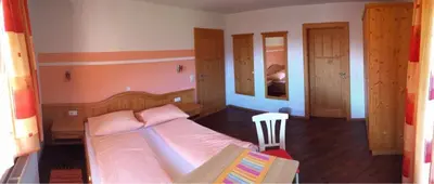 Ein Bett oder Betten in einem Zimmer der Unterkunft Maria's Sonnenquartier