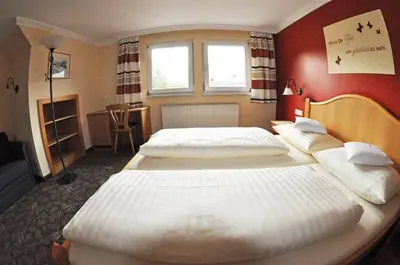 Ein Bett oder Betten in einem Zimmer der Unterkunft Frühstückspension Oberweissburg