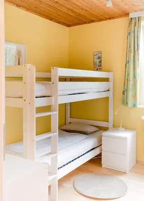 Ein Bett oder Betten in einem Zimmer der Unterkunft Ferienhaus Mountain View