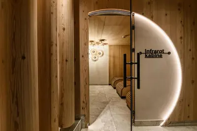 Ein Bett oder Betten in einem Zimmer der Unterkunft Hotel Zauchensee Zentral