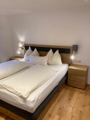 Ein Bett oder Betten in einem Zimmer der Unterkunft Bio-Bauernhof Nichlgut