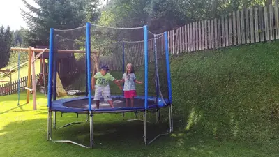 Ein Kinderspielbereich in der Unterkunft 4 Mountains Apartments