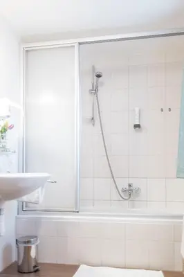 Ein Badezimmer in der Unterkunft Pension Feichthub