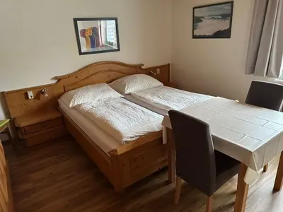 Ein Bett oder Betten in einem Zimmer der Unterkunft Apartment Familie Haupt