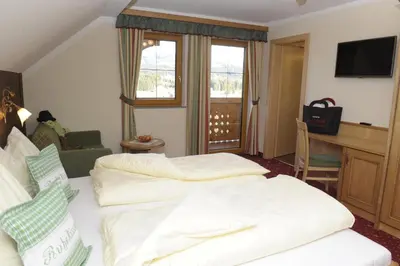 Ein Bett oder Betten in einem Zimmer der Unterkunft Bio-Bauernhof Samerhof