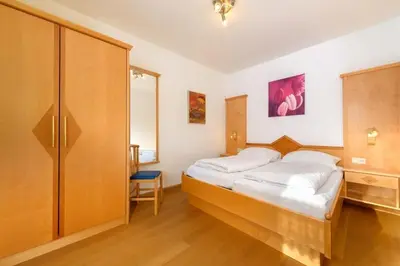 Ein Bett oder Betten in einem Zimmer der Unterkunft Ferienhaus Andreas