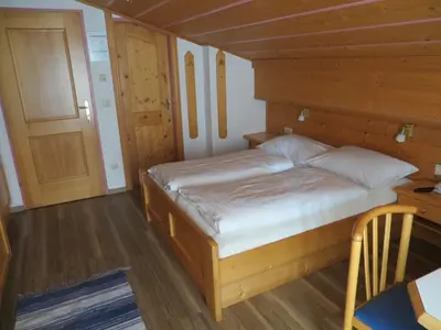 Ein Bett oder Betten in einem Zimmer der Unterkunft Ferienhaus Andreas