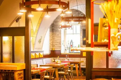 Ein Restaurant oder anderes Speiselokal in der Unterkunft Brauhaus zu Murau