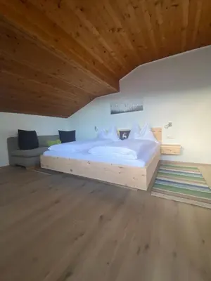 Ein Bett oder Betten in einem Zimmer der Unterkunft Gästehaus Lemmerer