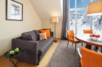 Ein Sitzbereich in der Unterkunft Aparthotel DIE SONNE