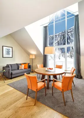 Ein Sitzbereich in der Unterkunft Aparthotel DIE SONNE